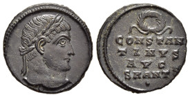 CONSTANTINE I THE GREAT (307/310-337). Follis. Antioch.

Obv: Laureate head right.
Rev: CONSTANTINVS AVG / (wreath) SMANTS / •.
Legend in four lines.
...