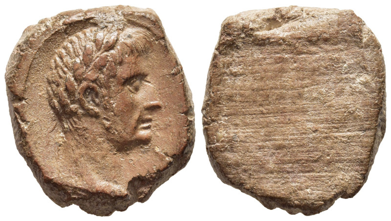 ROMAN EMPIRE. Tiberius? (14-37 AD). Teracotta Seal.

Obv: Laureate head right.
R...