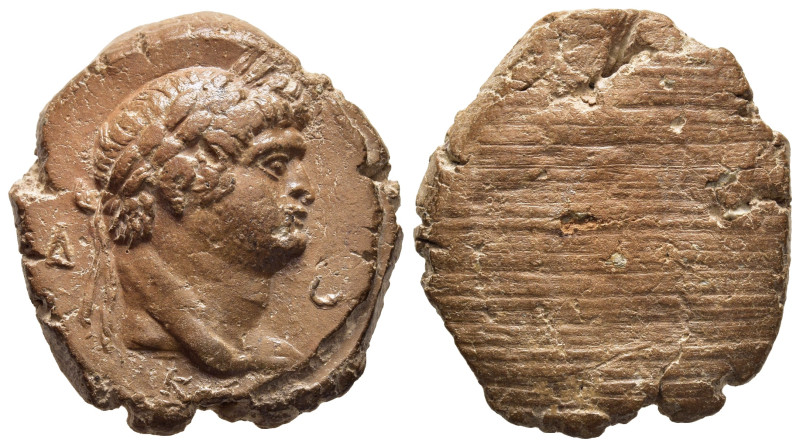 ROMAN EMPIRE. Domitian (Caesar 69-81). Teracotta Seal.

Obv: Δ- O/ K
Laureate he...
