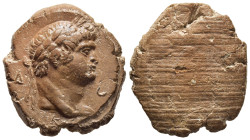 ROMAN EMPIRE. Domitian (Caesar 69-81). Teracotta Seal.

Obv: Δ- O/ K
Laureate head of Domitian.
Rev. Blank.

Condition: Extremely fine.

Weight: 4,70 ...