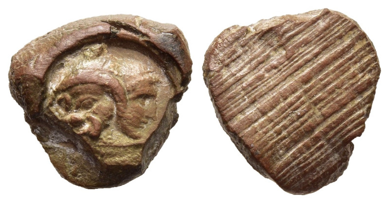 ROMAN EMPIRE. Teracotta Seal, Late 2nd-3rd century.

Obv: Gryllus consisting of ...