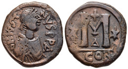 JUSTIN I (518 - 527). Follis. Constantinople.

Obv: D N IVSTINVS P P AVC.
Diademed, draped and cuirassed bust right.
Rev: Large M between two stars; c...