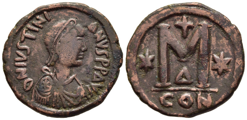 JUSTINIAN I (527-565). Follis. Constantinople.

Obv: D N IVSTINIANVS P P AVG.
Di...