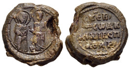 BYZANTINE EMPIRE. Lead Seal (circa 8th-9th centuries). 

Obv: Euphemia of Chalkedon and St. Paisios standing facing
Rev: Legend in four lines.

Condit...