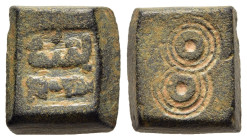 ISLAMIC WEIGHTS. Umayyads or Abbasids. Weight of 2 Dirhams . Bronze.

A Square shaped Umayyad or Abbasid coin weight ; inscription in Kufic on top, tw...
