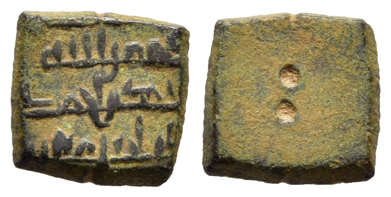 ISLAMIC WEIGHTS. Umayyads or Abbasids 5 Qirat AE weight. 

Square shaped; inscri...