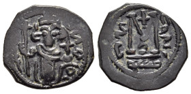 ISLAMIC. UMAYYADS. Arab- Byzantine types. AE Fals, bilingual series (ca. AD 660- 680). Dimashq (Damascus) mint. 

Obv: Byzantine style standing empero...