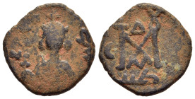 ISLAMIC. UMAYYADS. Arab- Byzantine types. AE Fals (AD 670s-680s). Tartus (Antarados).

Obv: Imperial bust facing, holding globus cruciger in her right...