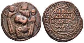 ISLAMIC. Artuqids (Mardin). Husam al-Din Yuluq Arslan (AH 580-597 / AD 1184-1200). AE Dirham (AH 589).

Obv: Three figures standing around one figure ...