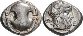 BOEOTIA. Thebes. Circa 425-395 BC. Stater (Silver, 22 mm, 12.22 g). Boeotian shield. Rev. Θ-E Bearded head of Dionysos to right, wearing wreath of ivy...
