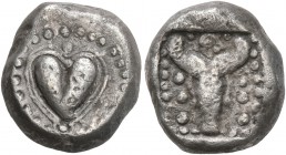 KYRENAICA. Kyrene. Circa 500-480 BC. Drachm (Silver, 13 mm, 4.22 g, 6 h), Attic standard. Silphium fruit within circle of dots. Rev. Winged female fig...