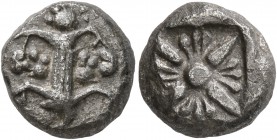 KYRENAICA. Kyrene. Circa 500-480 BC. Drachm (Silver, 12 mm, 3.57 g), 'Asiatic' standard. Silphium plant with fruits. Rev. Star-like floral pattern. BM...