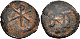 MEROVINGIANS. Royal Issues. Theudebert I, king of Austrasia , 534-548. Nummus (Bronze, 14 mm, 1.29 g, 5 h), Marseille, after 536. Christogram within w...