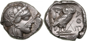 Attica, Athens AR Tetradrachm 440-404 BC
17.19g. 26mm. VF/VF. Graffity. Some luster. Kroll 8, HCG 4, 1597. Obv. Helmeted head of Athena to right, with...