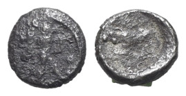 Italy, Northern Lucania, Poseidonia, c. 445-420 BC. AR Obol (8mm, 0.38g, 9h). Poseidon wielding trident r. R/ Bull standing r. Cf. HNItaly 1121. Fair