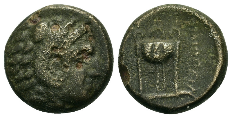 Macedon, Philippi, c. 356-345. Æ (15,9mm, 5.9g). Head of Herakles r, wearing lio...
