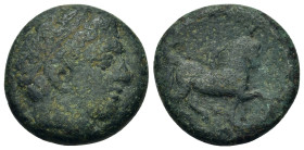Kings of Macedon. Philip II (359-336 BC). Æ Unit (20,4mm, 8.24g). Uncertain Macedonian mint. Head of Apollo r., wearing tainia. R/ Youth on horseback ...
