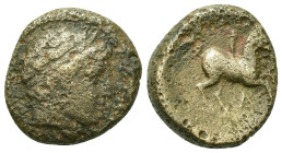 Kings of Macedon. Philip II (359-336 BC). Æ Unit (18,6mm, 7.3g). Uncertain Macedonian mint. Head of Apollo r., wearing tainia. R/ Youth on horseback r...