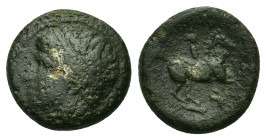 Kings of Macedon. Philip II (359-336 BC). Æ Unit (16,8mm, 6.24g). Uncertain Macedonian mint. Head of Apollo left, waering tainia. R/ Youth on horsebac...