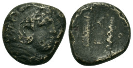 Kings of Macedon. Alexander III (336-323 BC). Æ (16,5mm, 6.1g). Uncertain Macedonian mint. Head of Herakles r., wearing lion skin. R/ Bow in bow-case ...