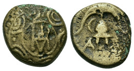 Kings of Macedon. Demetrios I Poliorketes (306-283 BC). Æ (15,2mm, 4.15g). Pella mint. Macedonian shield with monogram of Demetrios in central boss. R...