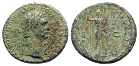 Domitian (81-96). Æ As (28mm, 11.26g, 6h). Rome, 88-9. Laureate bust r., wearing aegis. R/ Virtus standing r., l. foot on helmet, holding spear and pa...