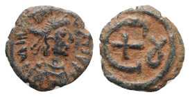Justinian I (527-565). Æ 5 Nummi (16mm, 1.77g, 6h). Theoupolis (Antioch), c. 546-551. Diademed, draped and cuirassed bust r. R/ Large Є with central c...