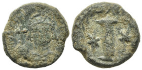 Justinian I (527-565). Æ 10 Nummi (17mm, 6.68g). Rome or Ravenna, 547-549. Helmeted and cuirassed facing bust, holding globus cruciger and shield. R/ ...