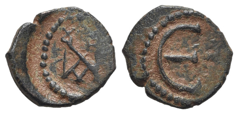 Justin II (565-578). Æ 5 Nummi (15mm, 1.73g, 6h). Constantinople. Monogram. R/ L...