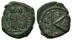 Justin II, and Sophia, Æ 20 Nummi (6,55g.). Uncertain military mint, dated year 4 = AD 568-569. D N IVS]TINVS P, Justin, holding globus cruciger, and ...