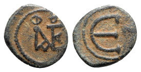 Justin II (565-578). Æ 5 Nummi (15mm, 1.64g, 6h). Theoupolis (Antioch). Monogram. R/ Large Є; cross to r. MIBE 65a; DOC 186; Sear 386. Brown, VF