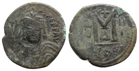 Maurice Tiberius (582-602). Æ 40 Nummi (30mm, 11.53g, 7h). Constantinople, year 3 (584/5). Helmeted and cuirassed bust facing, holding globus cruciger...
