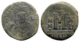 Maurice Tiberius (582-602). Æ 40 Nummi (27mm, 10.83g, 6h). Theoupolis (Antioch), year 15 (596/7). Crowned facing bust, wearing consular robes, holding...