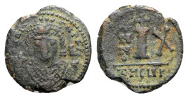 Maurice Tiberius (582-602). Æ 10 Nummi (19mm, 3.21g, 6h). Theoupolis (Antioch), year 10 (591/2). Crowned bust facing, wearing consular robes, holding ...