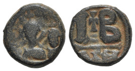 Heraclius (610-641). Æ 12 Nummi (15mm, 5.20g, 1h). Alexandria, 613-8. Crowned and draped busts of Heraclius and Heraclius Constantine facing. R/ Large...