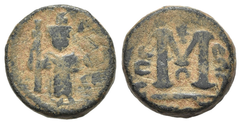 Islamic, Umayyad Caliphate. Standing caliph type, c. 680s. Æ Fals (18mm, 5.72g, ...