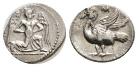 Greek
Cilicia, Mallos AR Obol. Circa 420-385 BC. Winged male figure advancing right, holding solar disk / Swan standing left. Casabonne Group 4; Gökt...