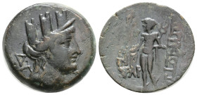 Cilicia, Korykos Æ 1st century BC. 7,3 g. 22,2 mm. Turreted head of Tyche to right; AK behind / KΩPYKIΩT[ΩN], Hermes standing to left, holding kerykei...