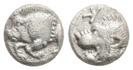 MYSIA. Kyzikos. Obol (Circa 450-400 BC).0,79 g.7,9 mm.
Obv: Forepart of boar left, with E (retrograde) on shoulder; to right, tunny upward.
Rev: Hea...