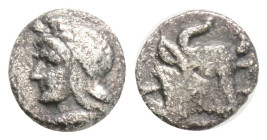 Mysia, Kyzikos AR Hemiobol. c. 410-400. Head of Attis l., wearing Phrygian cap; tunny below / Bull’s head .
0.3g 6,8 mm