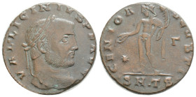 LICINIUS I (308-324) AD Follis. Thessalonica. 7,2 g. 23,4 mm.
Obv: VAL LICINIVS P F AVG. Laureate head right.
Rev: GENIO AVGVSTI / * - E / • SM • TS...