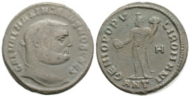 Maximian Æ Nummus. Antioch, circa 298 AD. IMP C M A MAXIMIANVS P F AVG, laureate head right / GENIO POPV LI ROMANI, Genius standing left, holding pate...