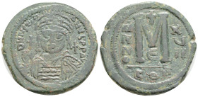 Byzantine Coins
JUSTINIAN I. (527-565). 20,2 g. 35,8 mm. Follis. Constantinople.
Obv: D N IVSTINIANVS P P AVG. Helmeted and cuirassed facing bust, h...