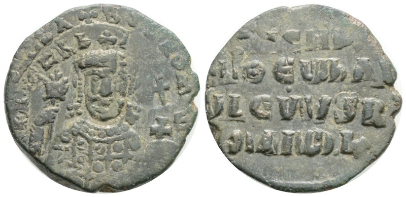 Romanus I Æ Nummus. AD 920-944. facing bust of Romanus I, bearded, wearing crown...