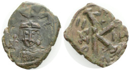 Constantine IV Æ 20 Nummi. Constantinople, AD 674-685. Helmeted and cuirassed bust facing, holding spear; M to right / Large K; [M] to left, cross to ...