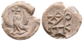 Byzantine Lead Seal (6th-7th centuries)
Obv: Eagle standing facing, head and tail right, wings spread; cross above
Rev: monogram (7,2 g, 20,6 mm dia...
