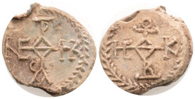 Byzantine Lead Seal ( 7-8 th centuries)
Obv: Cruciform monogram
Rev: Cruciform monogram (17 g, 25,1 mm.)