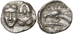 MESIE, ISTROS, AR trihémiobole, vers 350 av. J.-C. D/ Deux t. masc. de f. tête-bêche, la d. retournée. R/ ΙΣTPIH Aigle à g. sur un dauphin. Sous le da...
