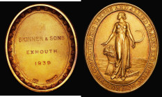 Prize Medal 1939 The Confectioners, Bakers and Allied Trader Exhibition London 51mm x 40mm oval, 38.53 grammes of 9 carat gold, awarded to Skinner & S...