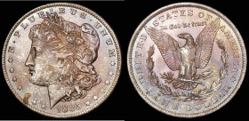USA One Dollar 1885O Breen 5583 UNC with minor cabinet friction, a stunning colourful tone displaying shades of magenta, gold and blue, a most eye-cat...
